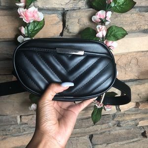 All black belted bag